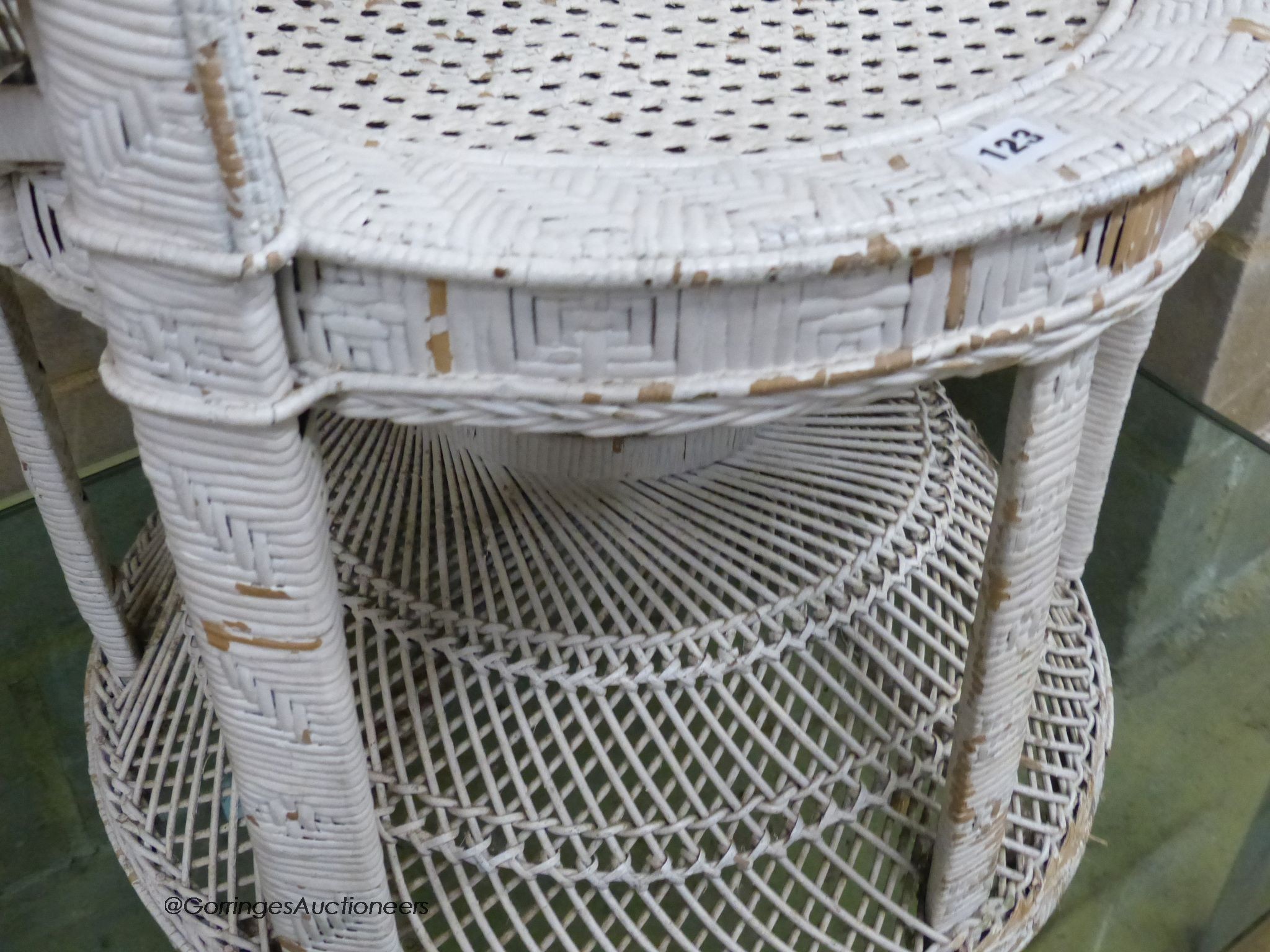 A white painted wickerwork peacock armchair, width 110cm, height 146cm